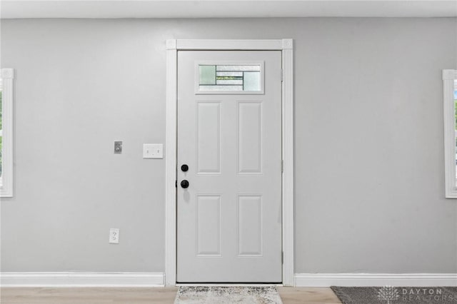 1189 Spinning Rd, Dayton, OH 45432 - entrance foyer with light wood-style flooring and baseboards