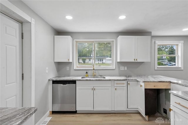 1189 Spinning Rd, Dayton, OH 45432 - kitchen with dishwasher, white cabinetry, light wood-type flooring, and recessed lighting