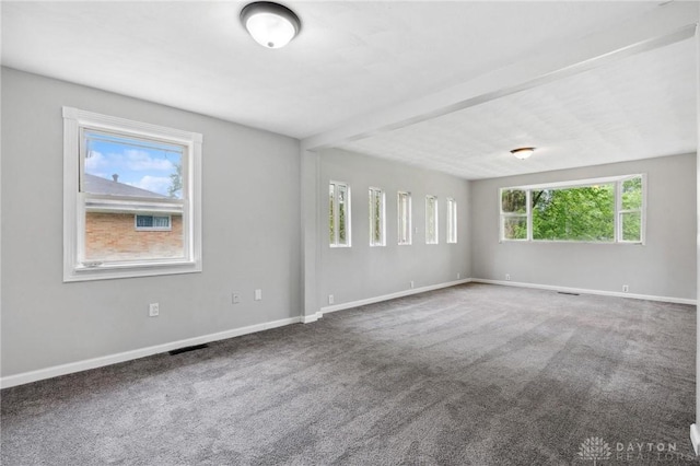 1189 Spinning Rd, Dayton, OH 45432 - empty room with carpet flooring and beamed ceiling