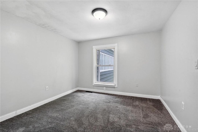 1189 Spinning Rd, Dayton, OH 45432 - unfurnished room with dark colored carpet