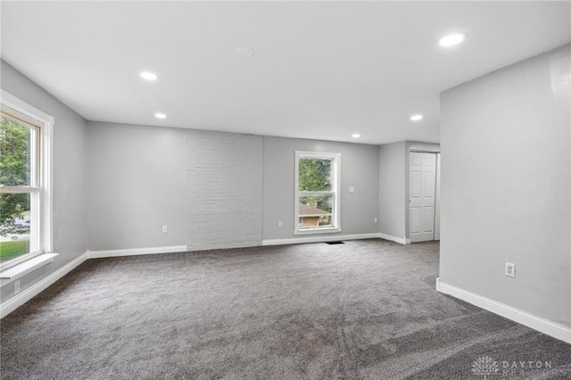 1189 Spinning Rd, Dayton, OH 45432 - empty room with healthy amount of natural light, recessed lighting, and carpet flooring