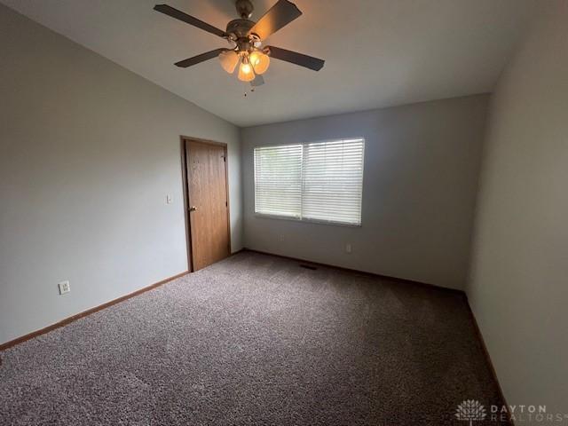 1616 Belvo Rd Unit 1610, Miamisburg, OH 45342 - carpeted empty room featuring lofted ceiling and a ceiling fan