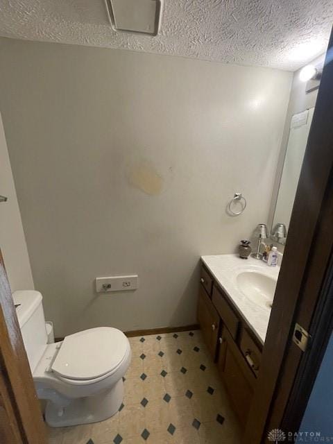 1616 Belvo Rd Unit 1610, Miamisburg, OH 45342 - bathroom with vanity and a textured ceiling