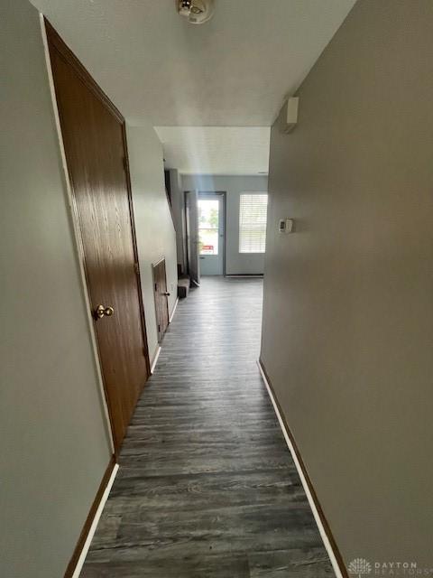 1608 Belvo Rd Unit 1602, Miamisburg, OH 45342 - corridor with baseboards and dark wood-type flooring