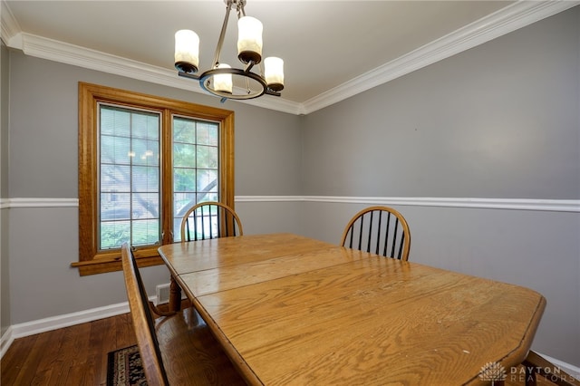 164 Winding Way, Kettering, OH 45429 - dining space with a chandelier, dark wood-style flooring, and ornamental molding