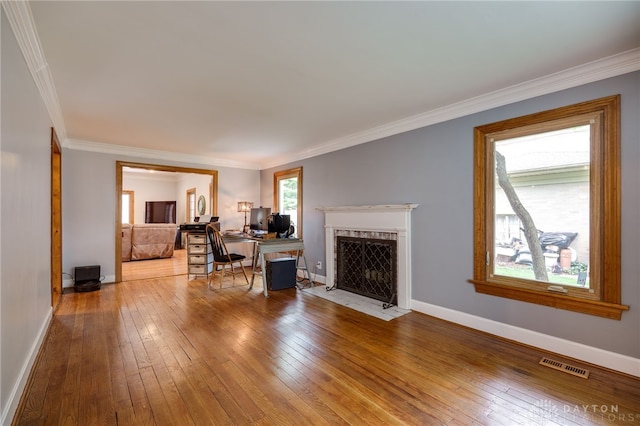 164 Winding Way, Kettering, OH 45429 - living area featuring hardwood / wood-style floors, a fireplace, and ornamental molding