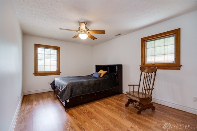 164 Winding Way, Kettering, OH 45429 - bedroom featuring light wood-style flooring and ceiling fan