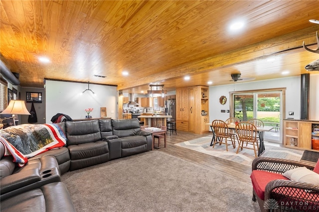 3075 Addison New Carlisle Rd, New Carlisle, OH 45344 - living area featuring wood ceiling, light wood-style flooring, and recessed lighting