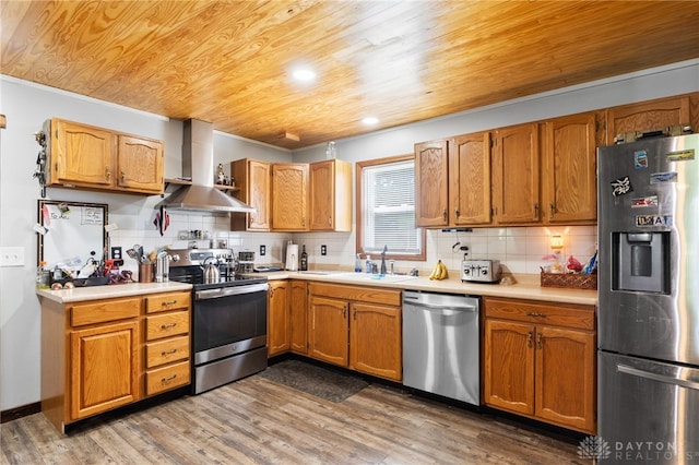 3075 Addison New Carlisle Rd, New Carlisle, OH 45344 - kitchen with stainless steel appliances, wall chimney range hood, wood ceiling, backsplash, and light countertops