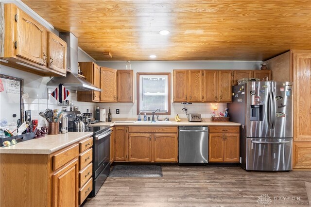 3075 Addison New Carlisle Rd, New Carlisle, OH 45344 - kitchen featuring stainless steel appliances, light countertops, wood finished floors, tasteful backsplash, and wood ceiling