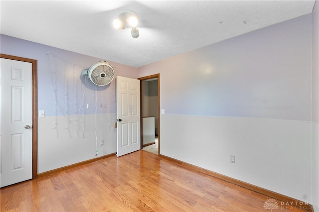 3075 Addison New Carlisle Rd, New Carlisle, OH 45344 - unfurnished room featuring light wood-style flooring and baseboards