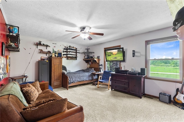 3075 Addison New Carlisle Rd, New Carlisle, OH 45344 - bedroom featuring light colored carpet, a textured ceiling, and ceiling fan