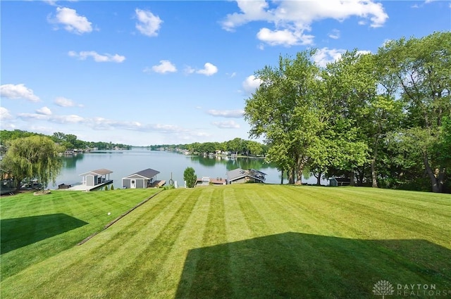 855 Quarry Rd, Silver Creek Twp, OH 45335 - view of grassy yard featuring a water view and a boat dock