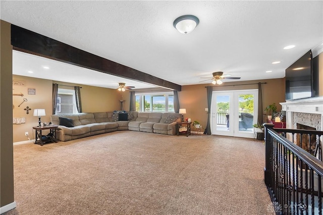 855 Quarry Rd, Silver Creek Twp, OH 45335 - carpeted living room featuring a ceiling fan, a textured ceiling, recessed lighting, and beam ceiling
