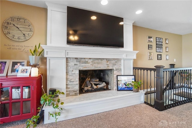 855 Quarry Rd, Silver Creek Twp, OH 45335 - living area with carpet flooring, a fireplace with raised hearth, and recessed lighting