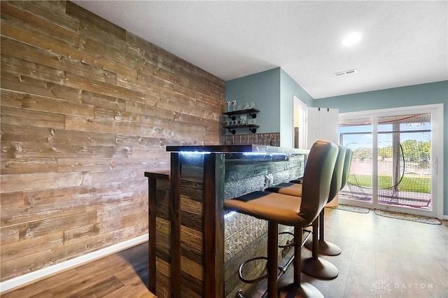 855 Quarry Rd, Silver Creek Twp, OH 45335 - indoor dry bar featuring wood walls and wood finished floors