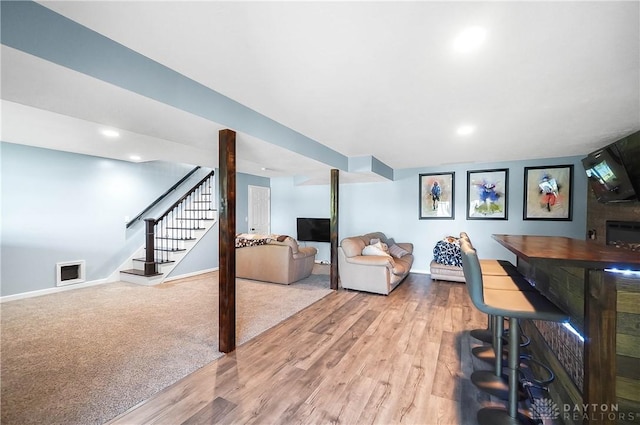 855 Quarry Rd, Silver Creek Twp, OH 45335 - living area with stairway, wood finished floors, and recessed lighting
