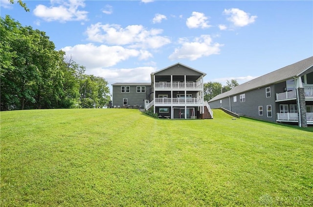 855 Quarry Rd, Silver Creek Twp, OH 45335 - back of property with stairs and a lawn