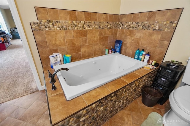 855 Quarry Rd, Silver Creek Twp, OH 45335 - bathroom with a tub with jets and tile patterned floors