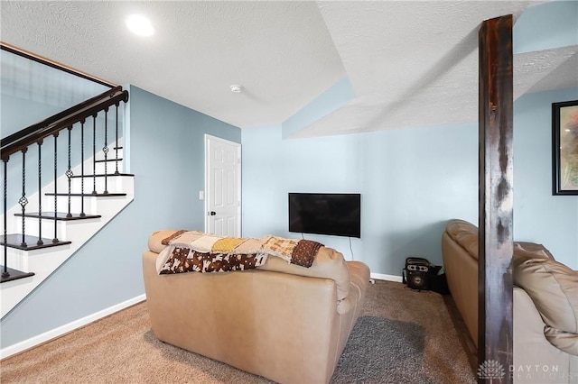 855 Quarry Rd, Silver Creek Twp, OH 45335 - living room with carpet, stairway, and a textured ceiling