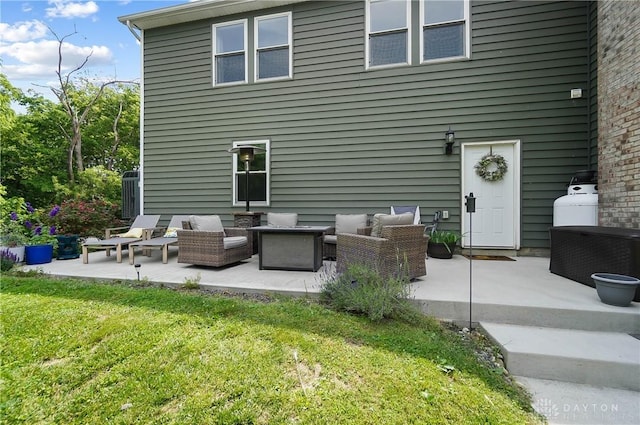 855 Quarry Rd, Silver Creek Twp, OH 45335 - rear view of property featuring an outdoor hangout area, a yard, and a patio