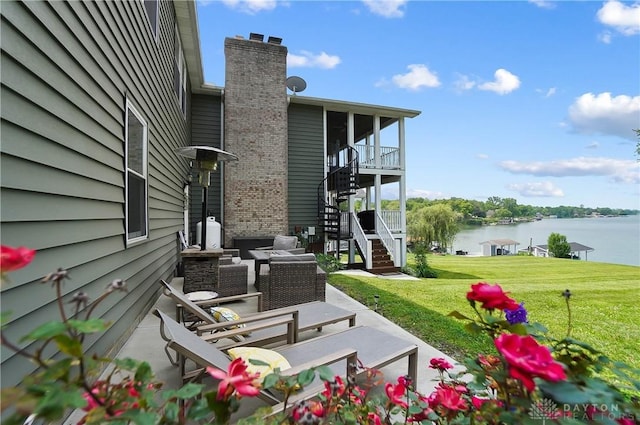 855 Quarry Rd, Silver Creek Twp, OH 45335 - view of patio / terrace with stairs and a water view