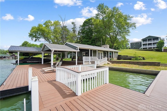 855 Quarry Rd, Silver Creek Twp, OH 45335 - dock area featuring a water view, a lawn, and boat lift