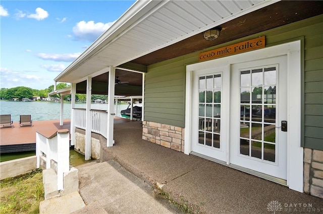 855 Quarry Rd, Silver Creek Twp, OH 45335 - view of patio featuring a water view