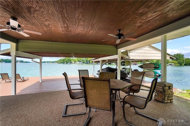 855 Quarry Rd, Silver Creek Twp, OH 45335 - view of patio / terrace featuring a ceiling fan, a water view, and a boat dock
