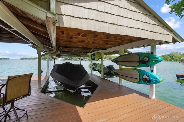 855 Quarry Rd, Silver Creek Twp, OH 45335 - dock with boat lift and a water view