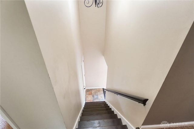 855 Quarry Rd, Silver Creek Twp, OH 45335 - staircase featuring baseboards