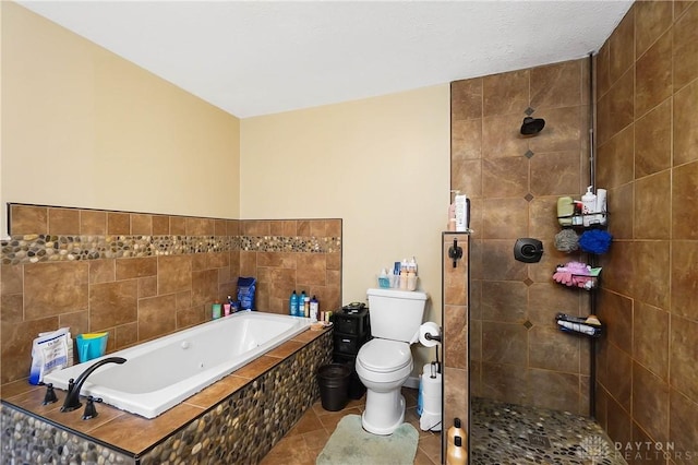 855 Quarry Rd, Silver Creek Twp, OH 45335 - full bath featuring a jetted tub, a tile shower, and tile patterned floors