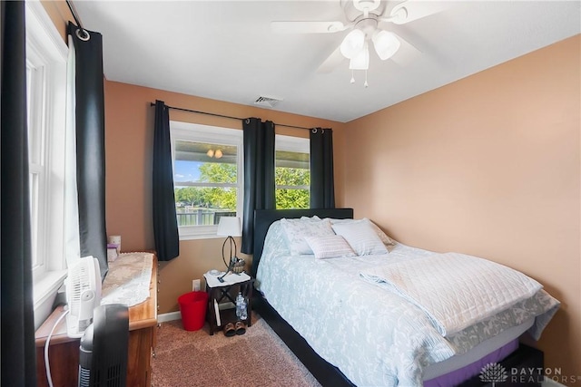 855 Quarry Rd, Silver Creek Twp, OH 45335 - carpeted bedroom featuring baseboards and a ceiling fan