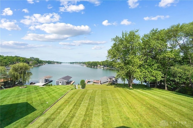 855 Quarry Rd, Silver Creek Twp, OH 45335 - view of grassy yard with a water view and a boat dock