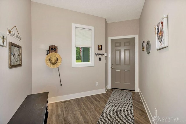 1015 Settlemyre Rd, Oregonia, OH 45054 - entrance foyer with dark wood-type flooring and baseboards