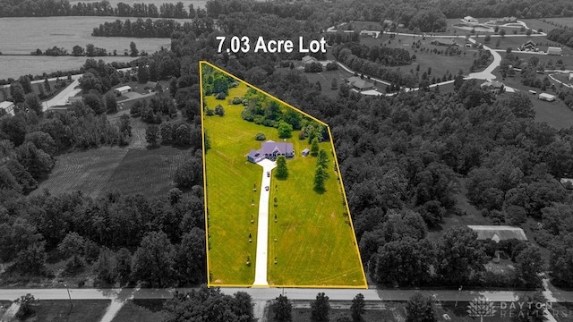 1015 Settlemyre Rd, Oregonia, OH 45054 - aerial view of property's location with property parcel outlined and a heavily wooded area
