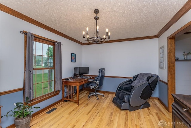 2025 Seneca Dr, Troy, OH 45373 - home office with light wood-style flooring, a chandelier, ornamental molding, and a textured ceiling