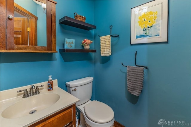 2025 Seneca Dr, Troy, OH 45373 - half bathroom featuring toilet and vanity