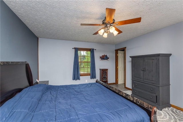 2025 Seneca Dr, Troy, OH 45373 - bedroom with a textured ceiling, a ceiling fan, and carpet floors
