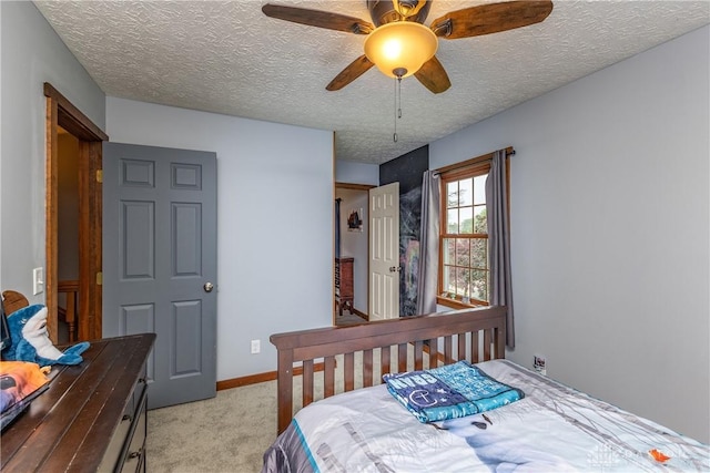 2025 Seneca Dr, Troy, OH 45373 - bedroom featuring light carpet, a textured ceiling, and ceiling fan