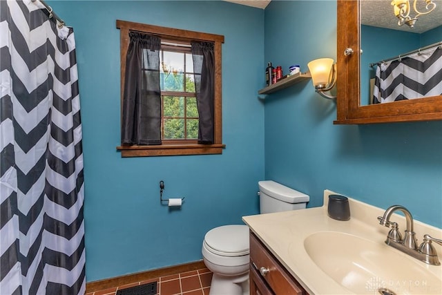 2025 Seneca Dr, Troy, OH 45373 - bathroom featuring tile patterned floors, vanity, a shower with curtain, and a textured ceiling