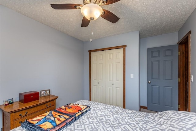 2025 Seneca Dr, Troy, OH 45373 - bedroom with a closet, ceiling fan, a textured ceiling, and carpet