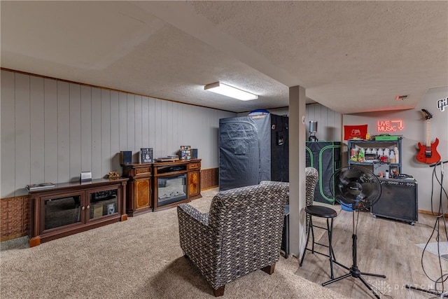 2025 Seneca Dr, Troy, OH 45373 - living area featuring a textured ceiling and wood finished floors