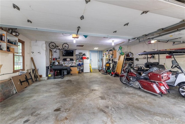 2025 Seneca Dr, Troy, OH 45373 - garage featuring a garage door opener