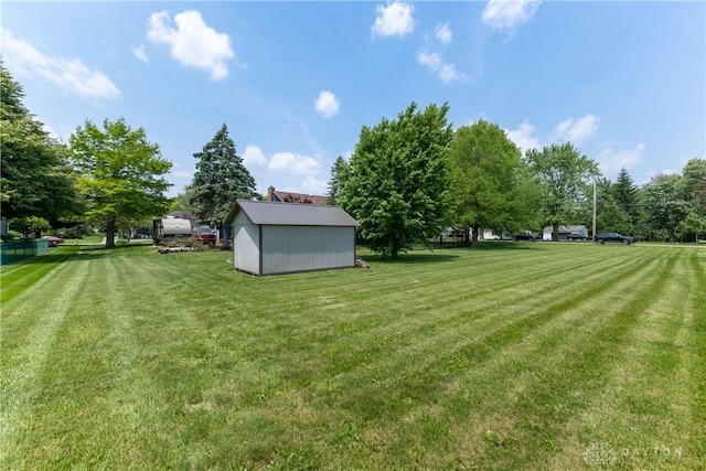 2025 Seneca Dr, Troy, OH 45373 - view of green lawn with a shed