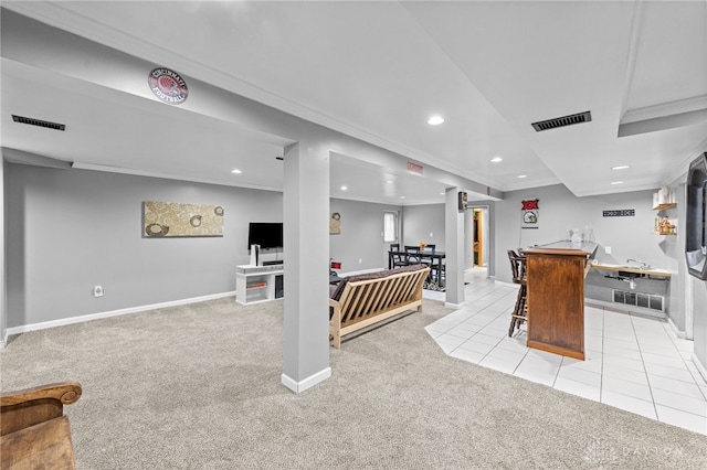 8684 Woodview Dr, Cincinnati, OH 45231 - kitchen with light carpet, recessed lighting, ornamental molding, and light tile patterned floors