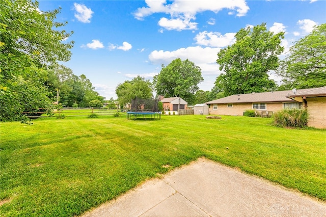 8684 Woodview Dr, Cincinnati, OH 45231 - view of yard featuring a trampoline