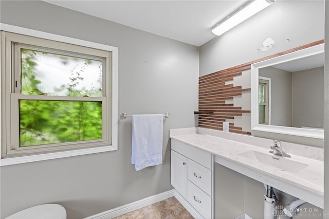8684 Woodview Dr, Cincinnati, OH 45231 - bathroom featuring baseboards and vanity