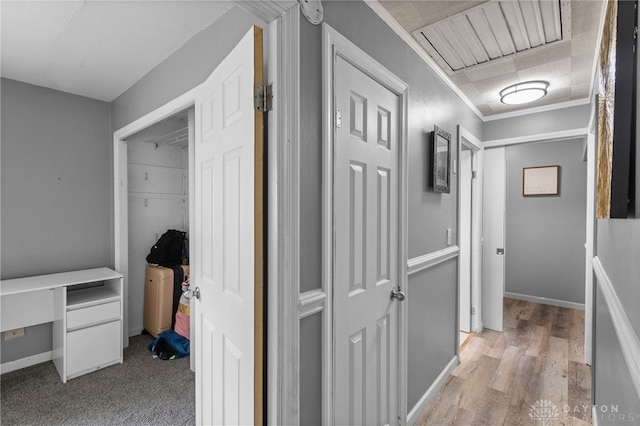 8684 Woodview Dr, Cincinnati, OH 45231 - hallway with baseboards and light wood-style flooring