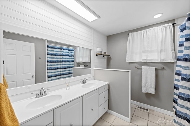 8684 Woodview Dr, Cincinnati, OH 45231 - full bathroom with double vanity and tile patterned floors